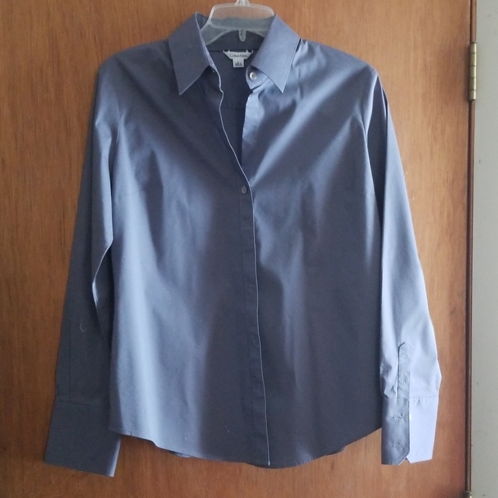 A long sleeved blouse by Calvin Klein